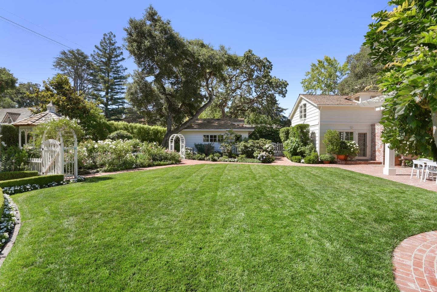76 Catalpa Drive Atherton, CA 94027 - Photo 32 of 52 a front view of a house with garden