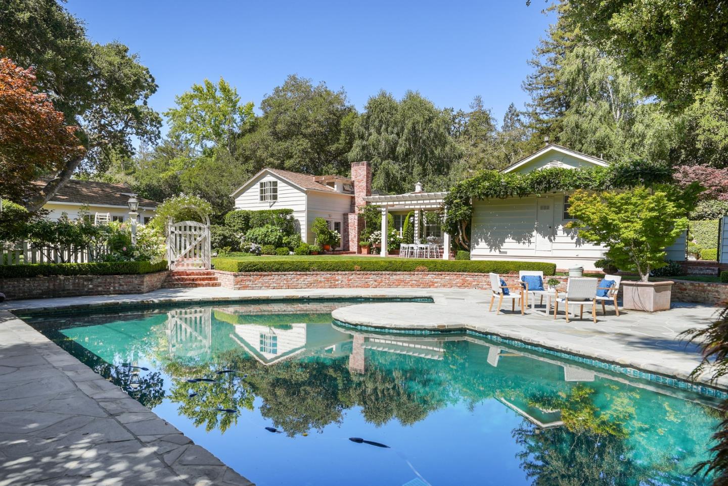 76 Catalpa Drive Atherton, CA 94027 - Photo 39 of 52 a swimming pool view with a outdoor seating