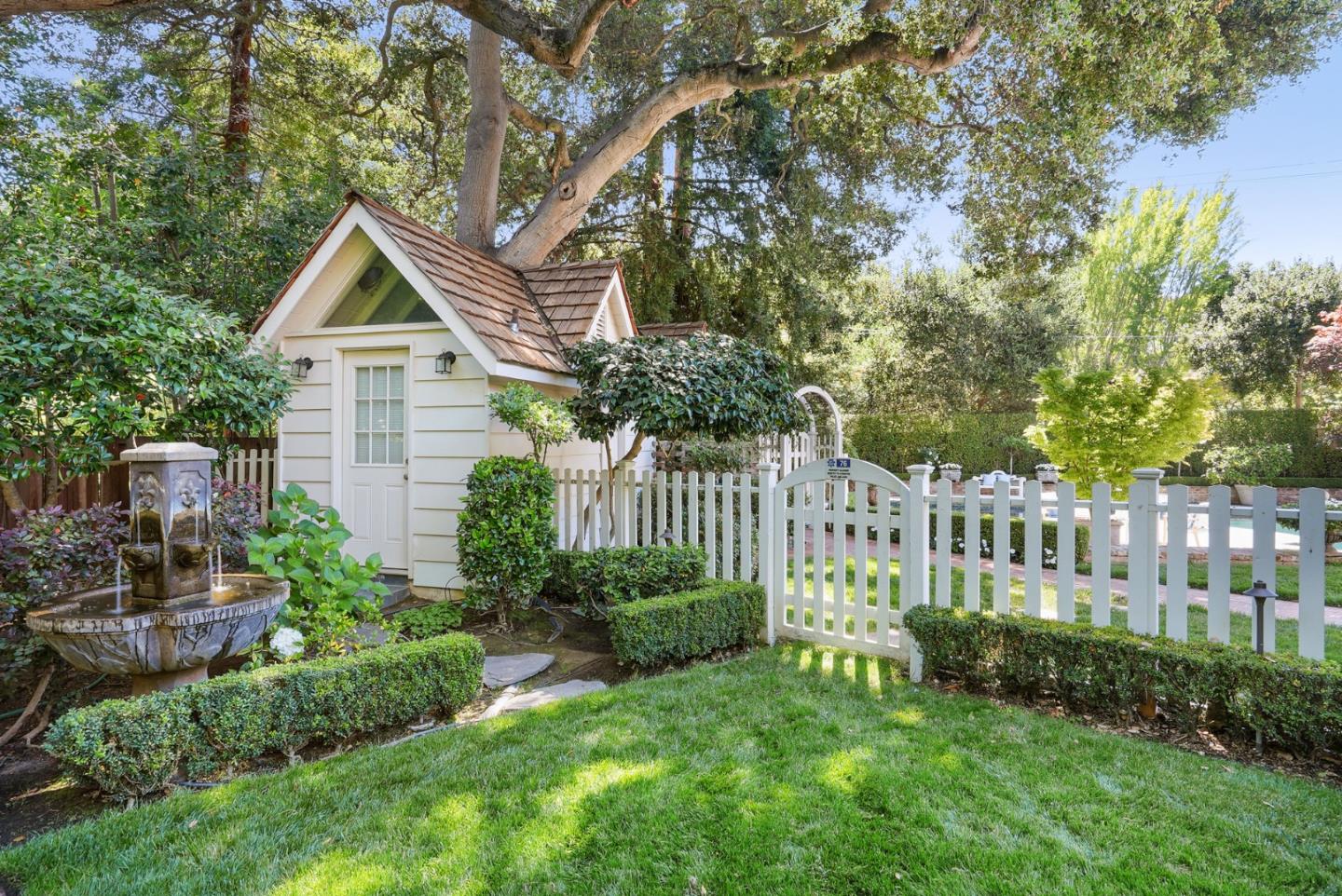 76 Catalpa Drive Atherton, CA 94027 - Photo 43 of 52 a house view with a garden