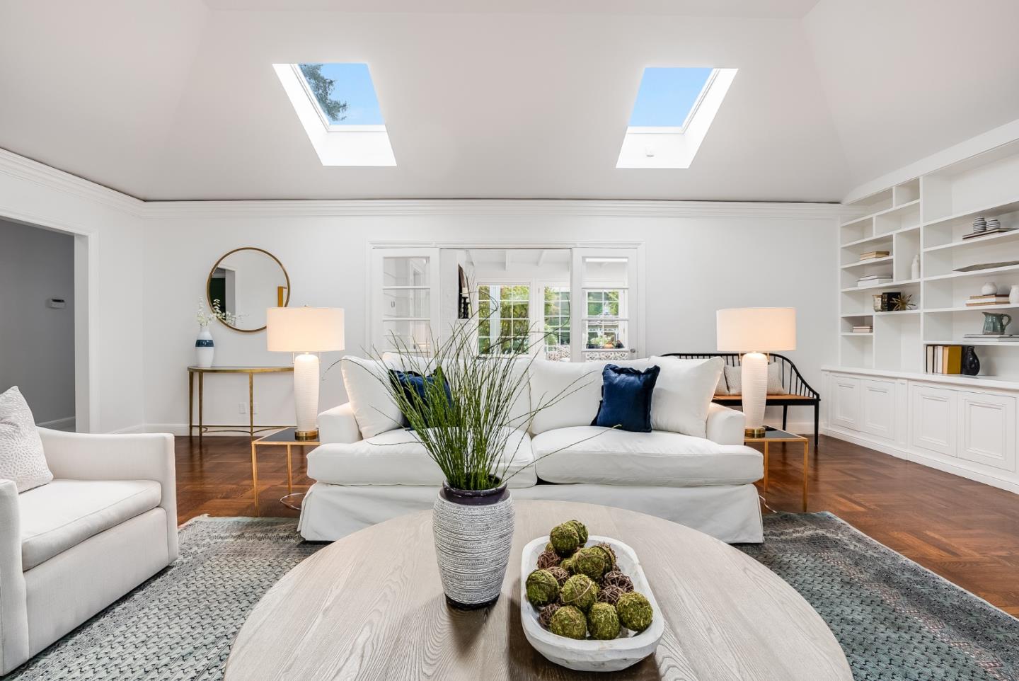 76 Catalpa Drive Atherton, CA 94027 - Photo 9 of 52 a living room with furniture and a wooden floor