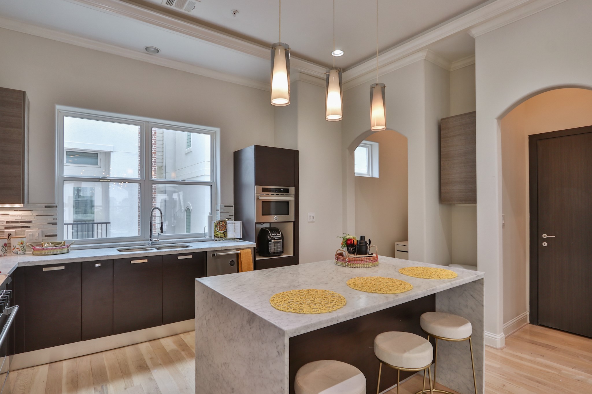 4114 Driscoll Street Houston, TX 77098 - Photo 13 of 50 a bathroom with a granite countertop sink and a mirror
