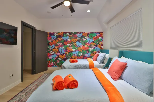 a bedroom with a bed and a couch