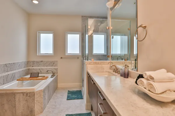 a bathroom with a sink and a bathtub