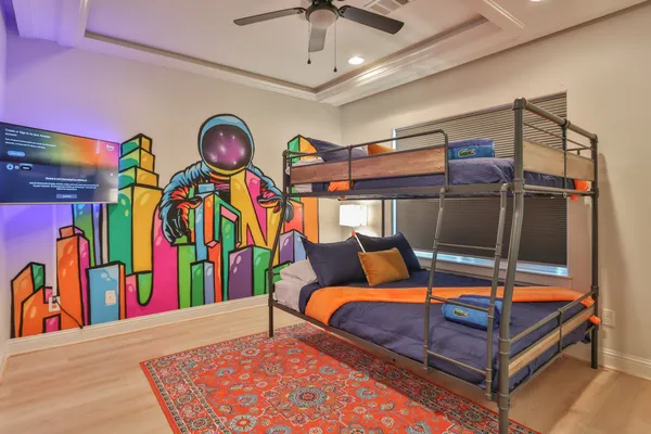 a bedroom with furniture and a bed