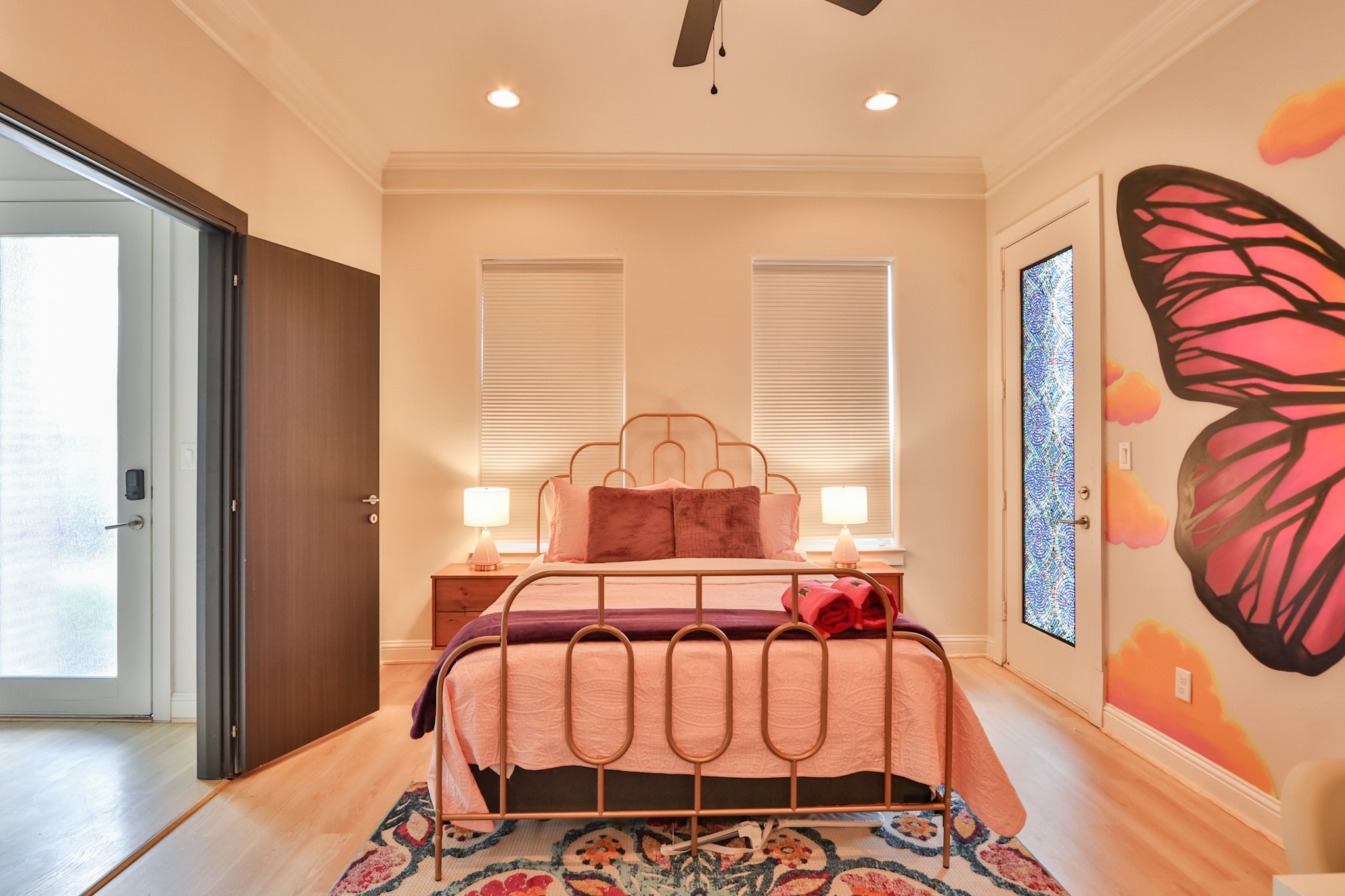 4114 Driscoll Street Houston, TX 77098 - Photo 36 of 50 a bedroom with a bed and wooden floor