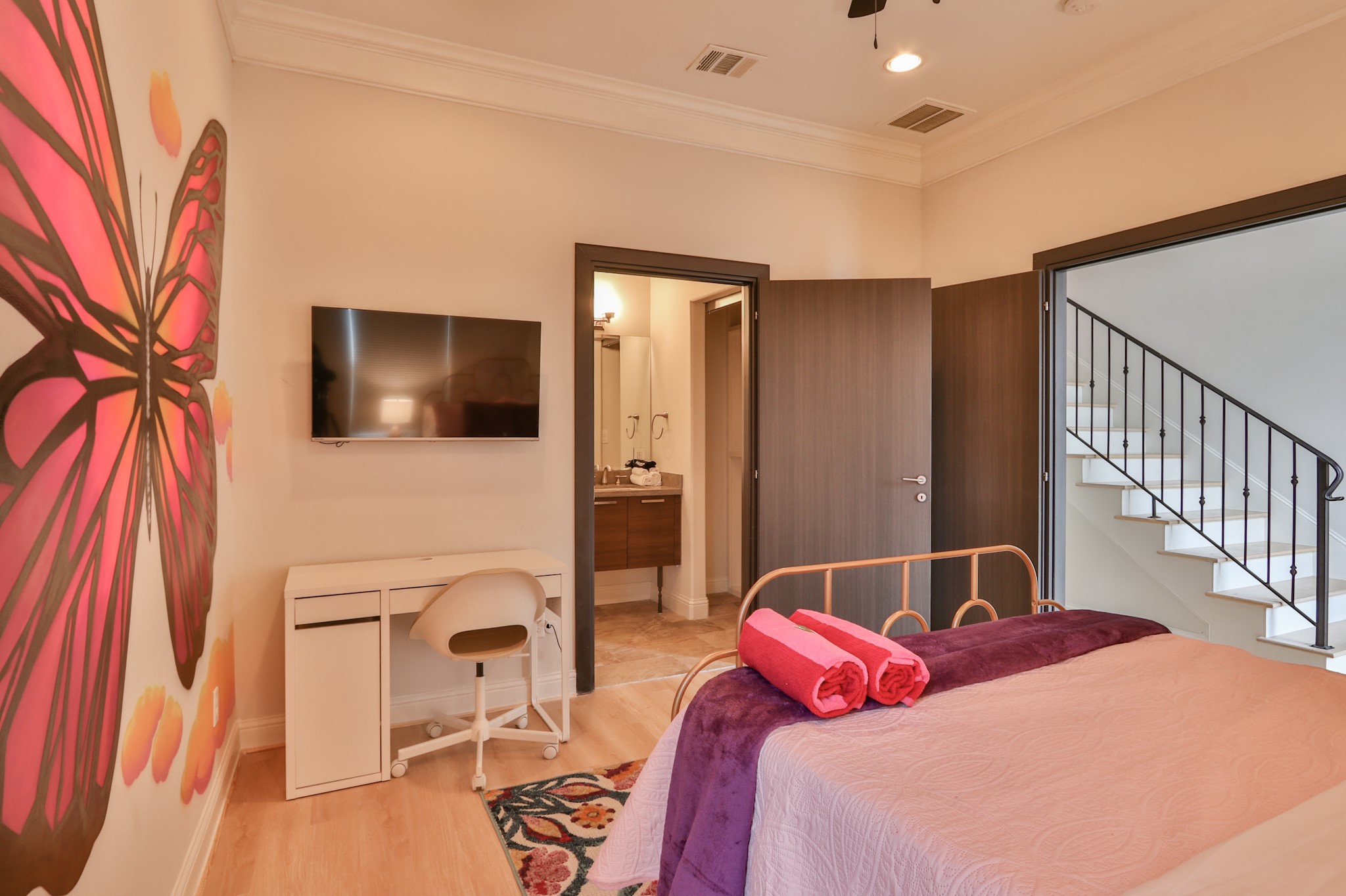 4114 Driscoll Street Houston, TX 77098 - Photo 37 of 50 a bedroom with a bed and a flat screen tv