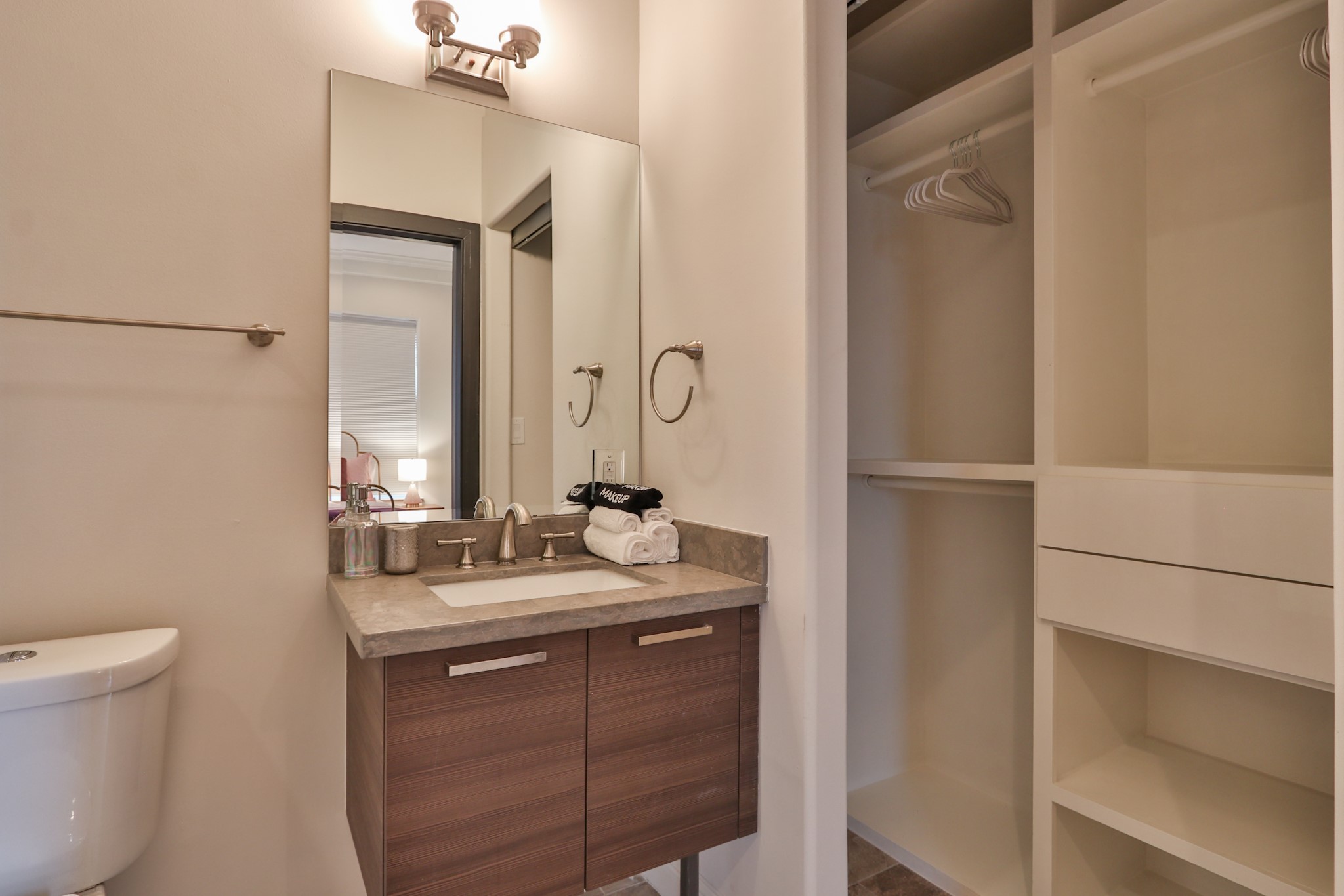 4114 Driscoll Street Houston, TX 77098 - Photo 39 of 50 a bathroom with a double vanity sink and a mirror