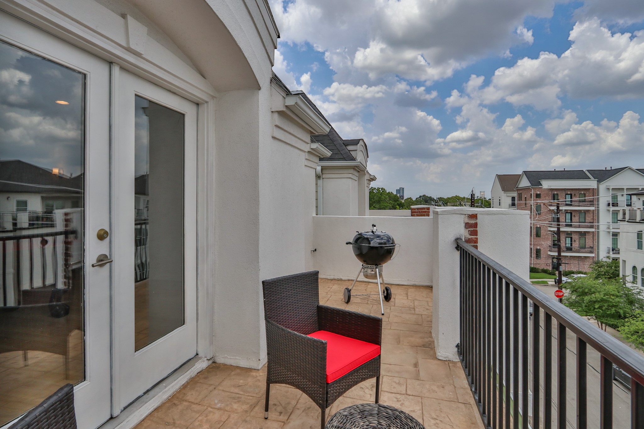 4114 Driscoll Street Houston, TX 77098 - Photo 45 of 50 a view of a balcony with an outdoor seating