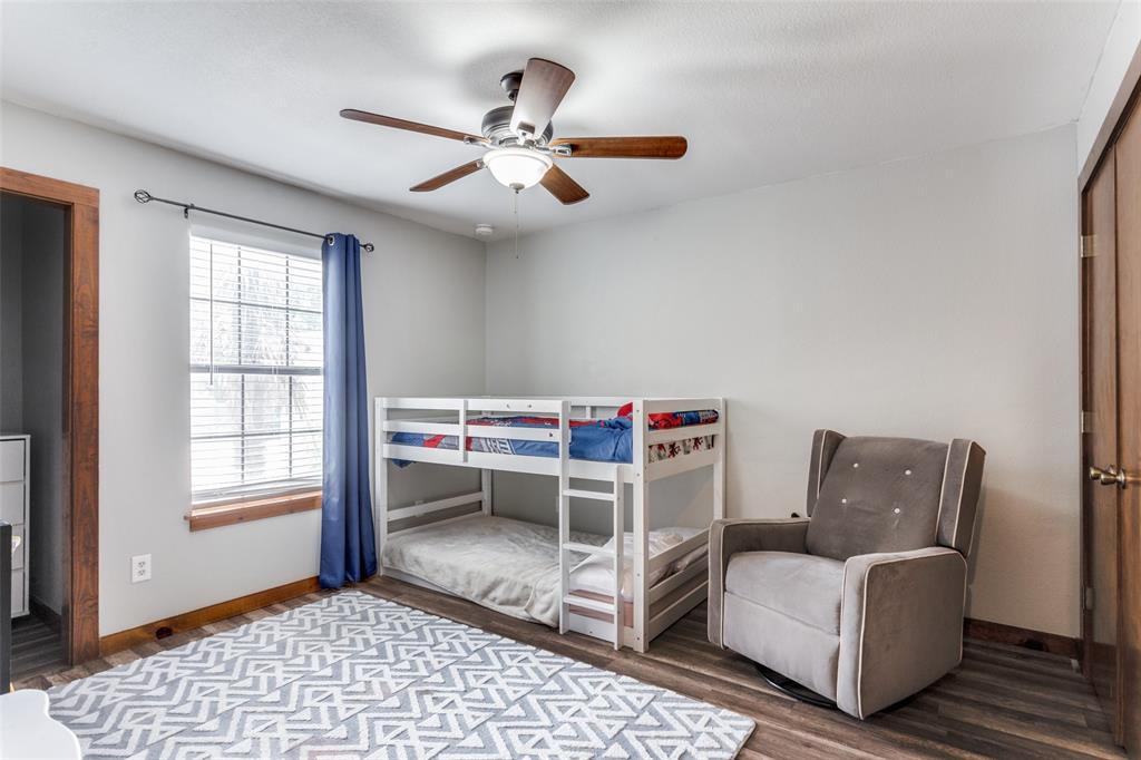950 Johnson Bend Road Weatherford, TX 76088 - Photo 25 of 40 a living room with furniture and a window