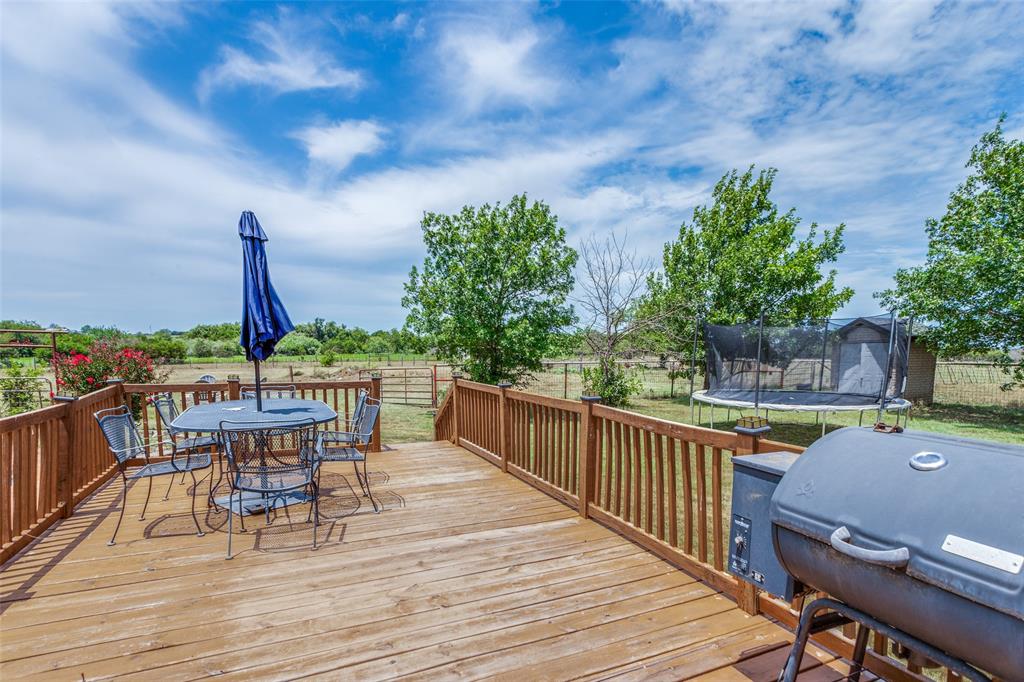 950 Johnson Bend Road Weatherford, TX 76088 - Photo 33 of 40 a view of a chairs on the roof deck