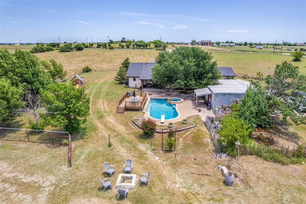 950 Johnson Bend Road Weatherford, TX 76088 - Photo 37 of 40 a view of a lake with houses in the back