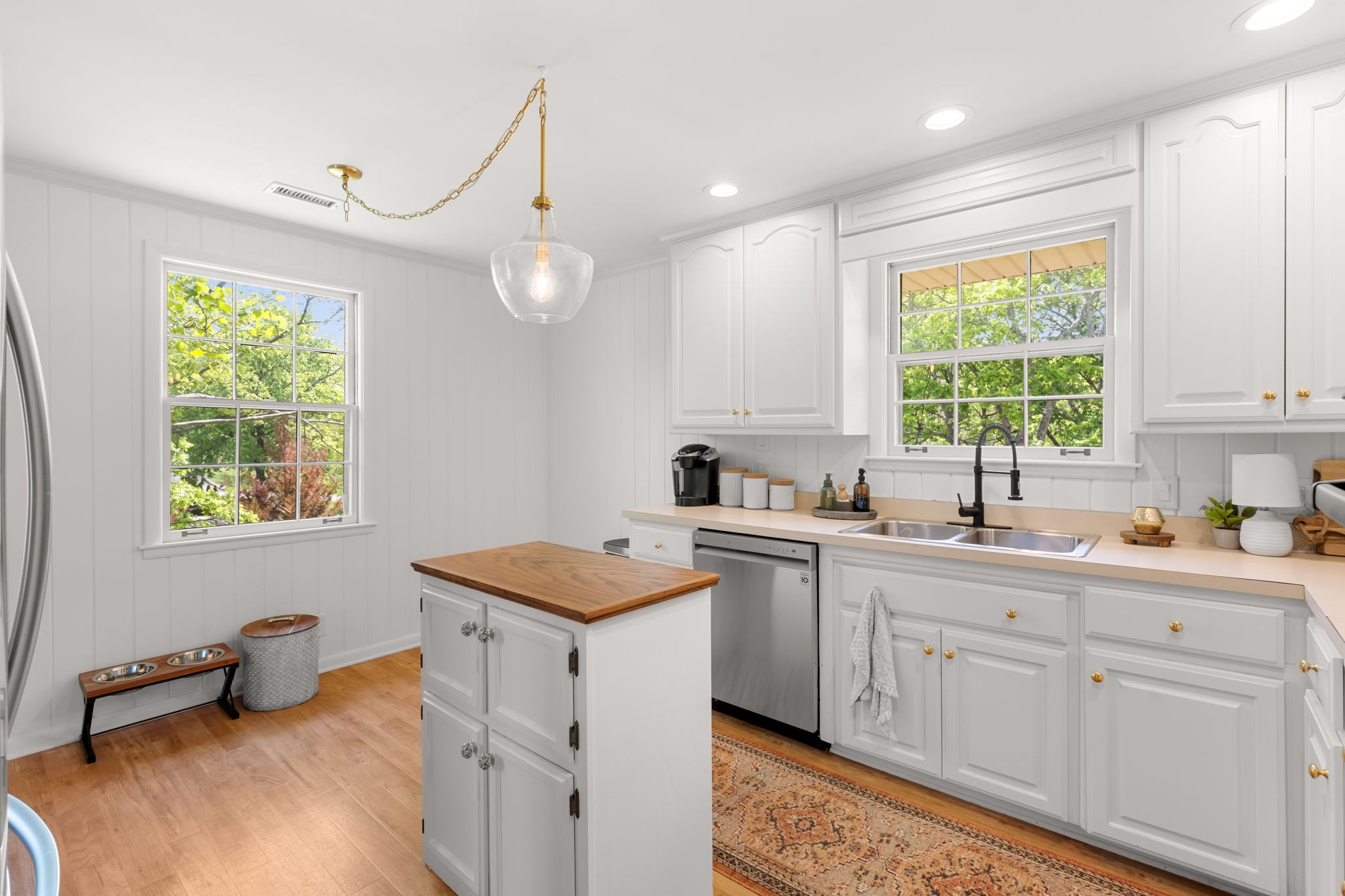705 Vanoke Drive Madison, TN 37115 - Photo 11 of 40 a kitchen that has a sink and a stove in it