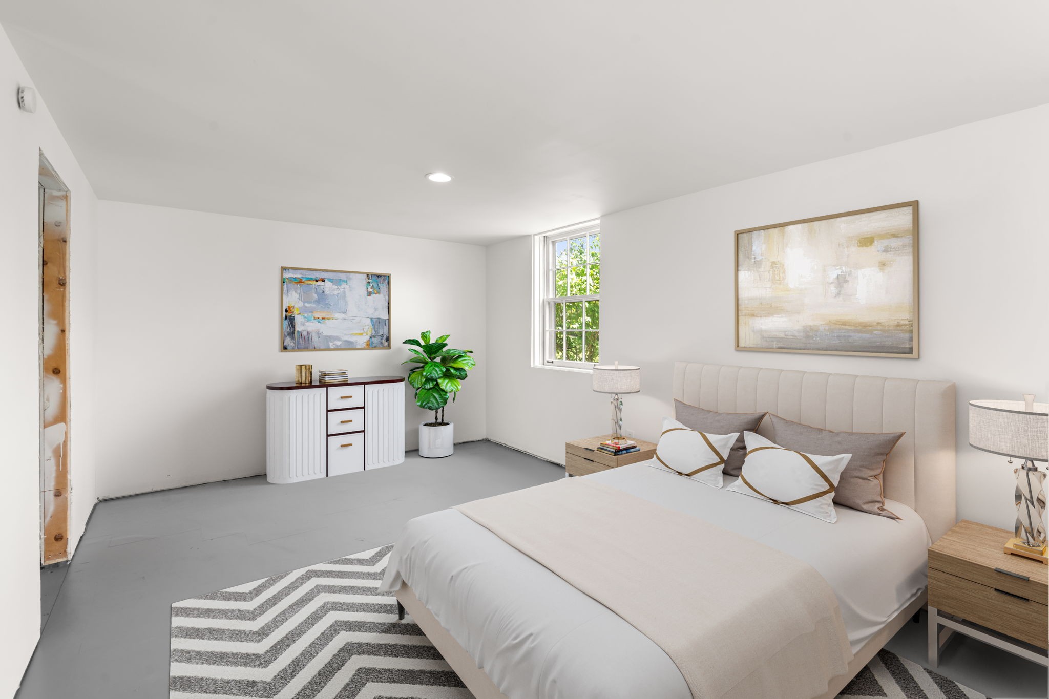 705 Vanoke Drive Madison, TN 37115 - Photo 24 of 40 a bedroom with a bed a potted plant and a window