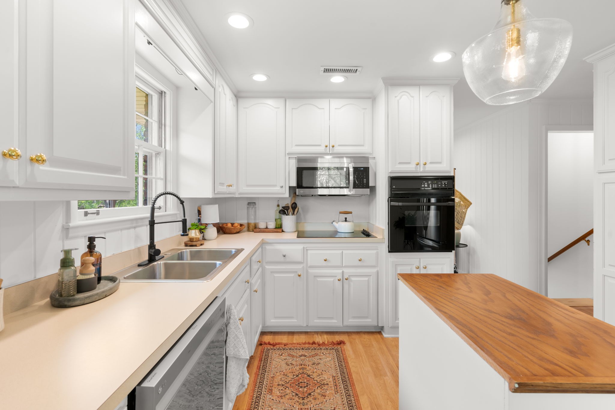 705 Vanoke Drive Madison, TN 37115 - Photo 9 of 40 a kitchen with a sink a stove and cabinets