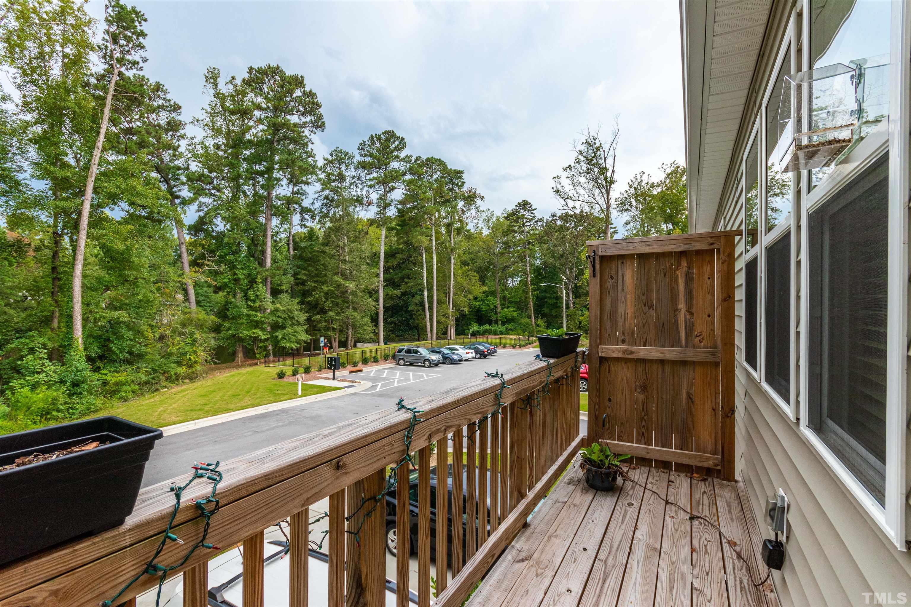 3702 Buffaloe Road Raleigh, NC 27604 - Photo 11 of 13 a view of a wooden deck and a backyard