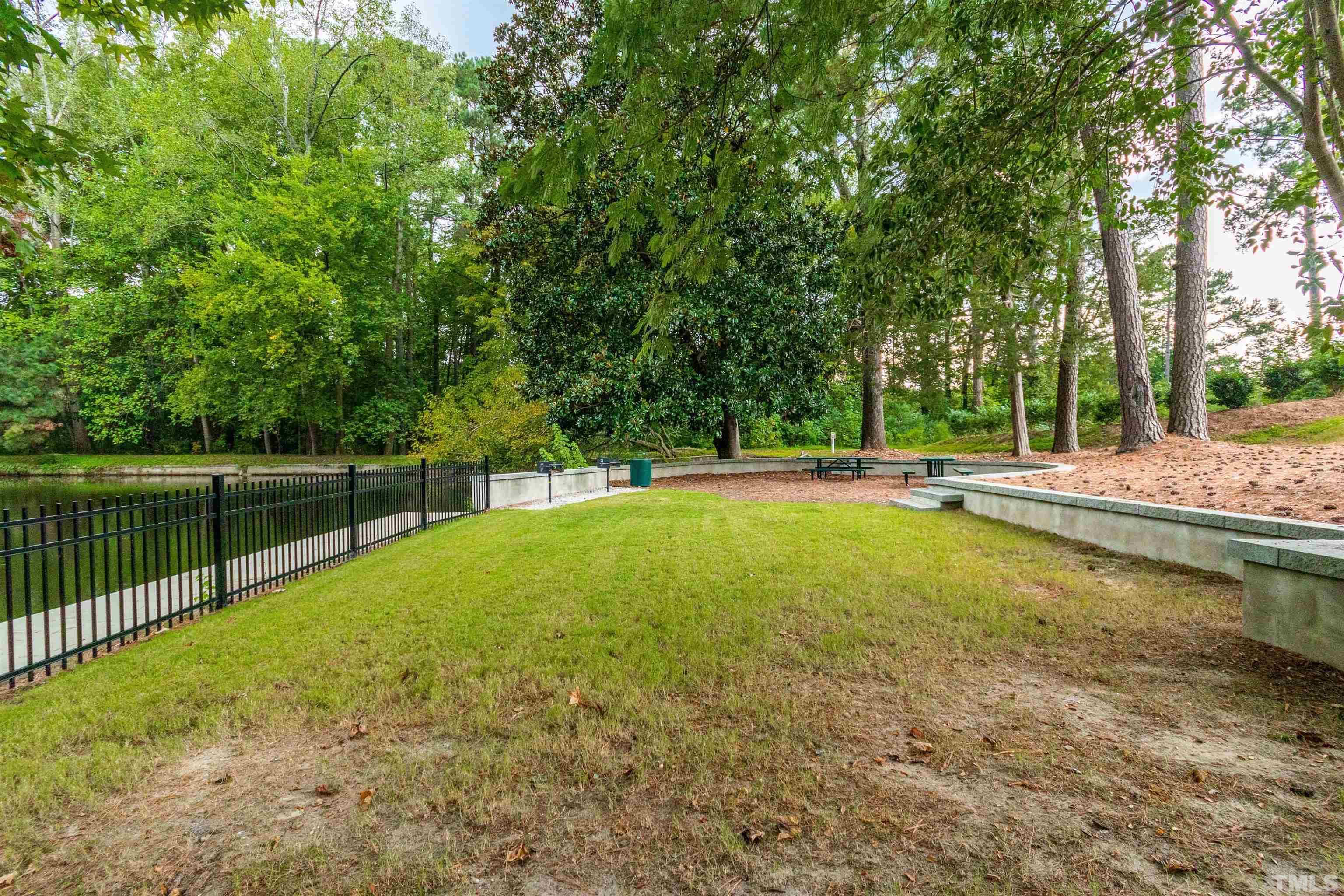 3702 Buffaloe Road Raleigh, NC 27604 - Photo 13 of 13 a view of a swimming pool with a patio