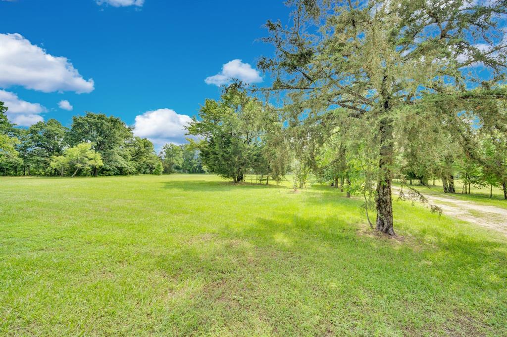 10476 County Road 313 Terrell, TX 75161 - Photo 34 of 40 a backyard of a house with lots of green space