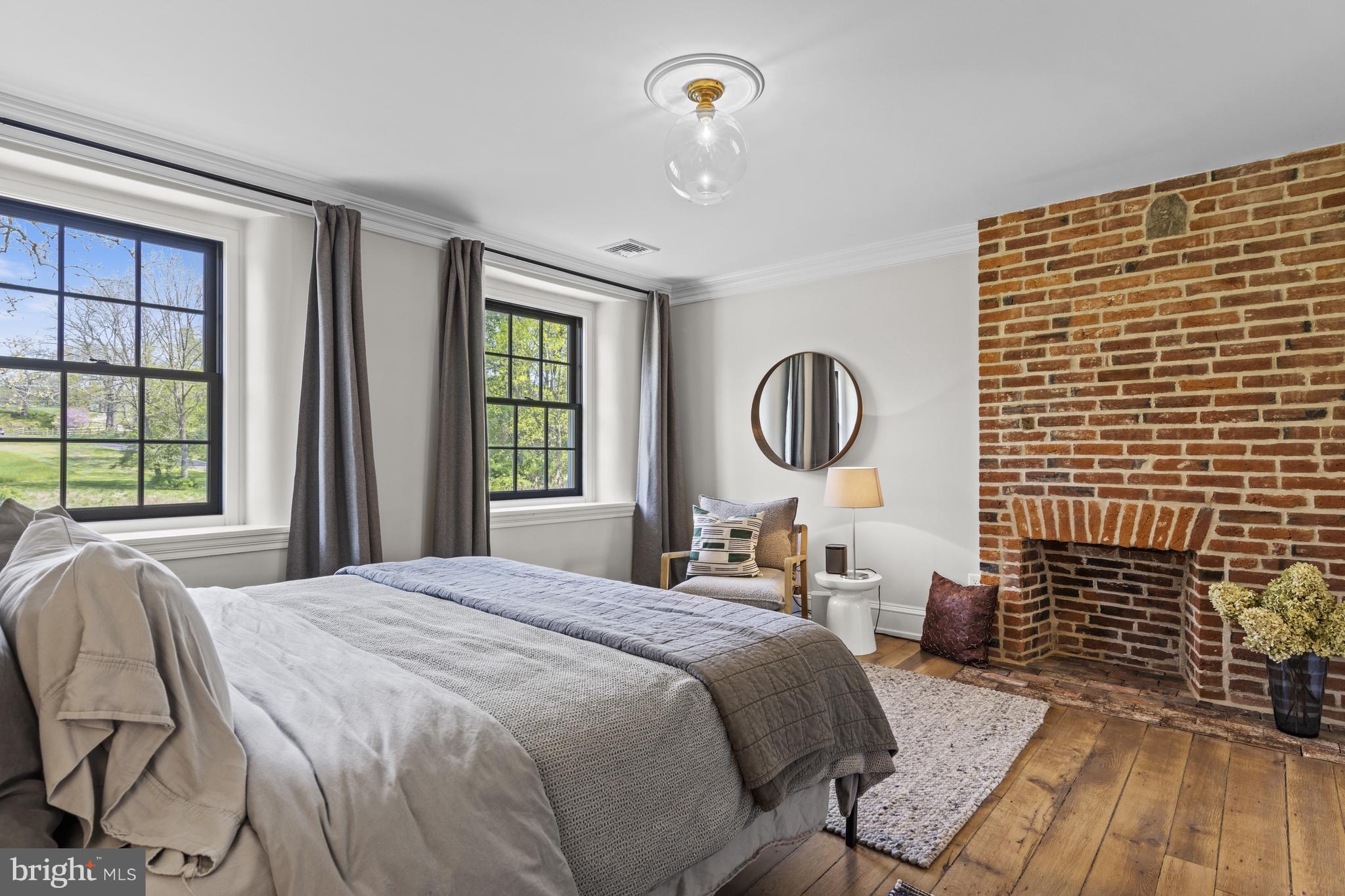 1250 Hillendale Road Chadds Ford, PA 19317 - Photo 37 of 76 a bedroom with a bed and windows