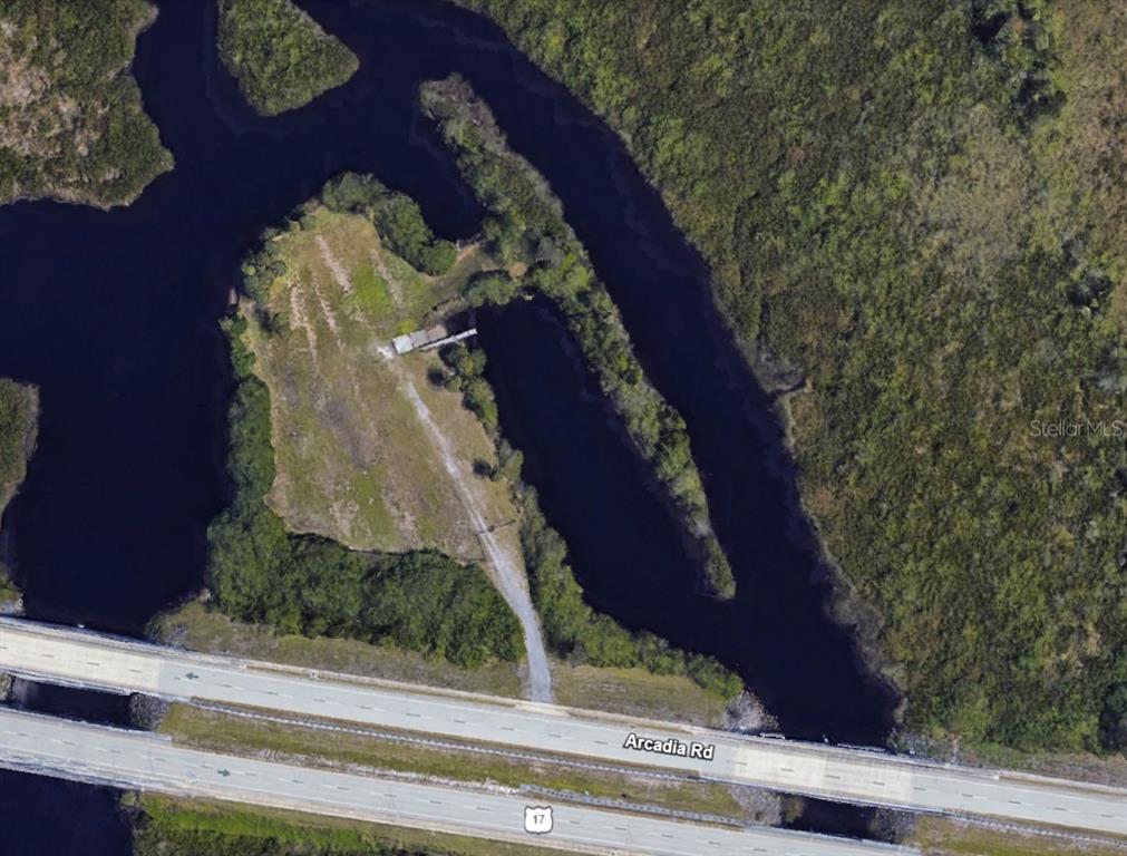 30102 Red Pine Road Punta Gorda, FL 33982 - Photo 7 of 8 a vase of flowers sitting on a table