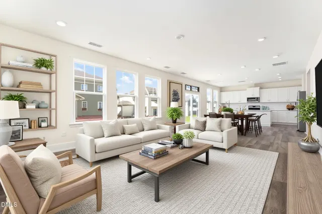 a living room with furniture and a table