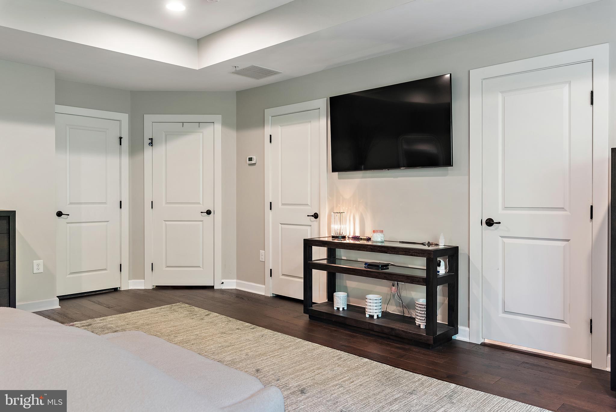 138 Merrimack Way Arnold, MD 21012 - Photo 20 of 50 a living room with a flat screen tv and a fireplace