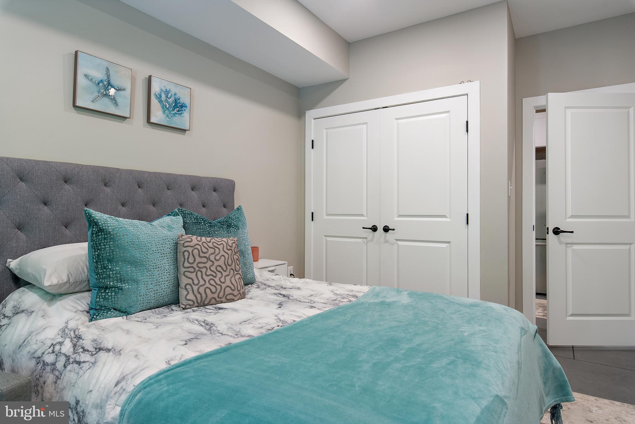 138 Merrimack Way Arnold, MD 21012 - Photo 29 of 50 a bedroom with a bed and painting on the wall