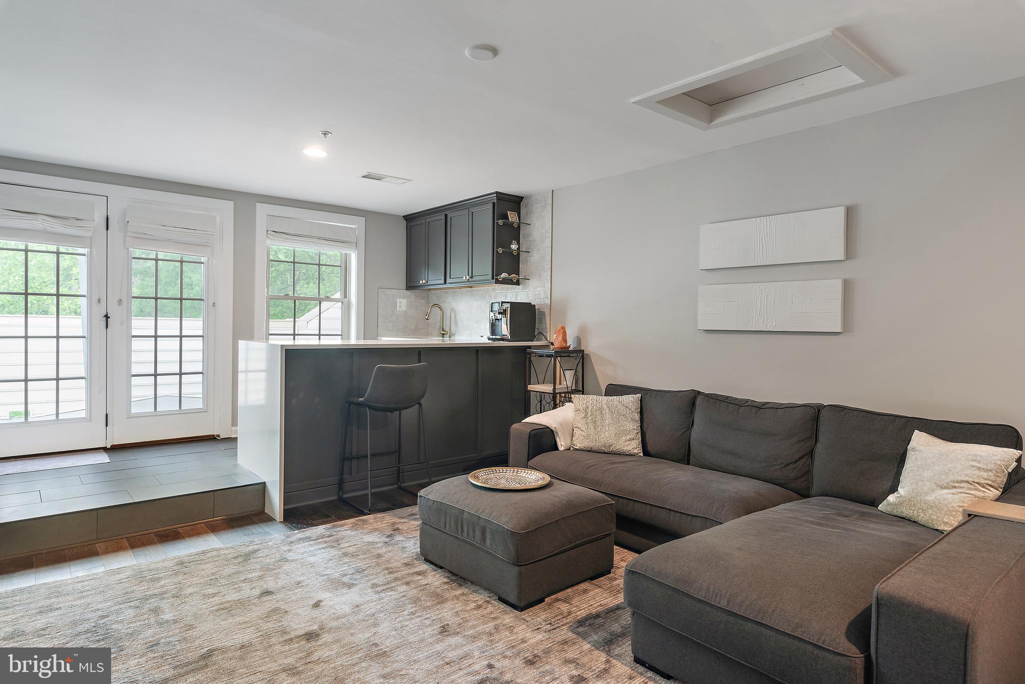 138 Merrimack Way Arnold, MD 21012 - Photo 35 of 50 a living room with furniture and a flat screen tv