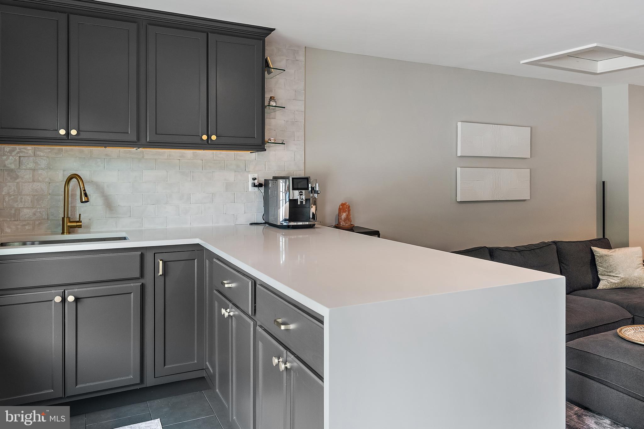 138 Merrimack Way Arnold, MD 21012 - Photo 39 of 50 a kitchen with a sink cabinets and appliances