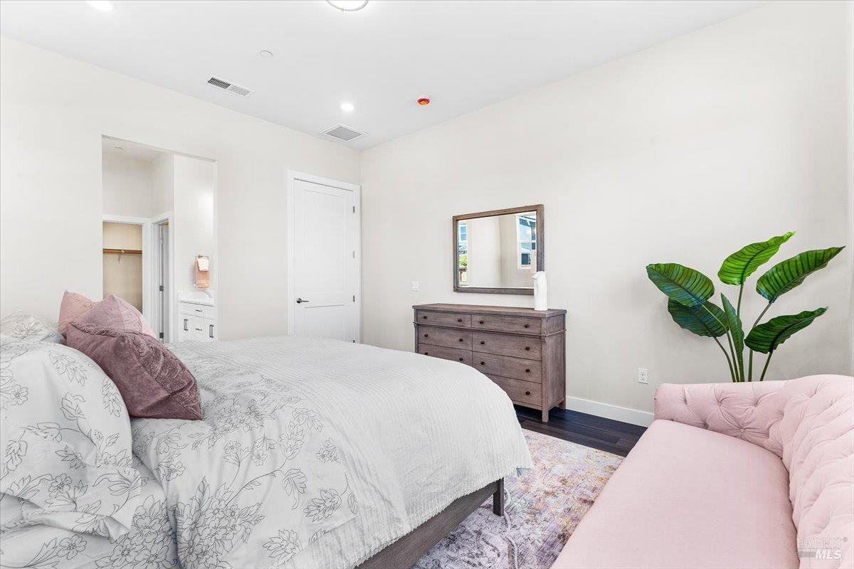 7301 Willowglen Drive Rohnert Park, CA 94928 - Photo 20 of 32 a bedroom with a bed and a couch