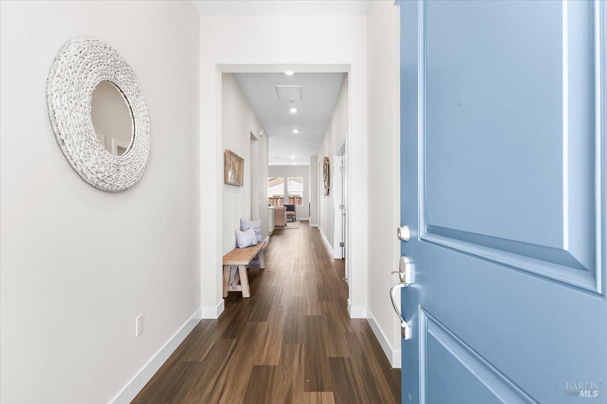7301 Willowglen Drive Rohnert Park, CA 94928 - Photo 3 of 32 a view of a hallway with wooden floor