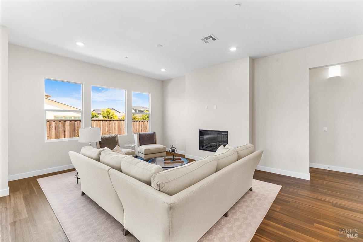 7301 Willowglen Drive Rohnert Park, CA 94928 - Photo 5 of 32 a living room with furniture and a fireplace