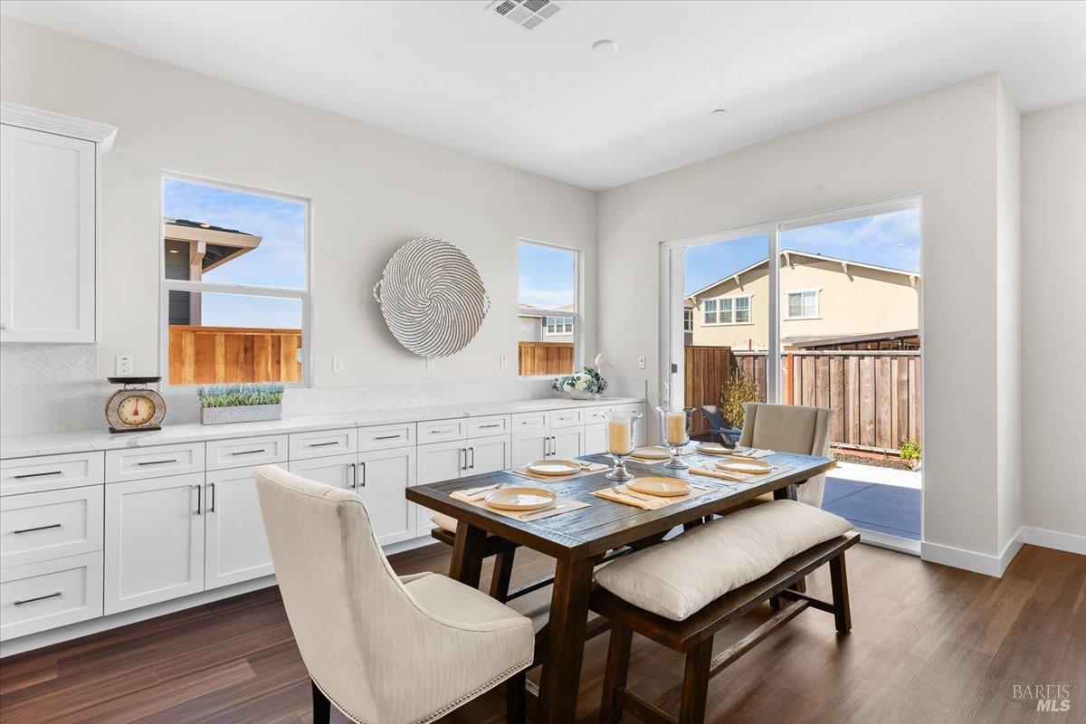 7301 Willowglen Drive Rohnert Park, CA 94928 - Photo 10 of 32 a view of a dining room with furniture and wooden floor