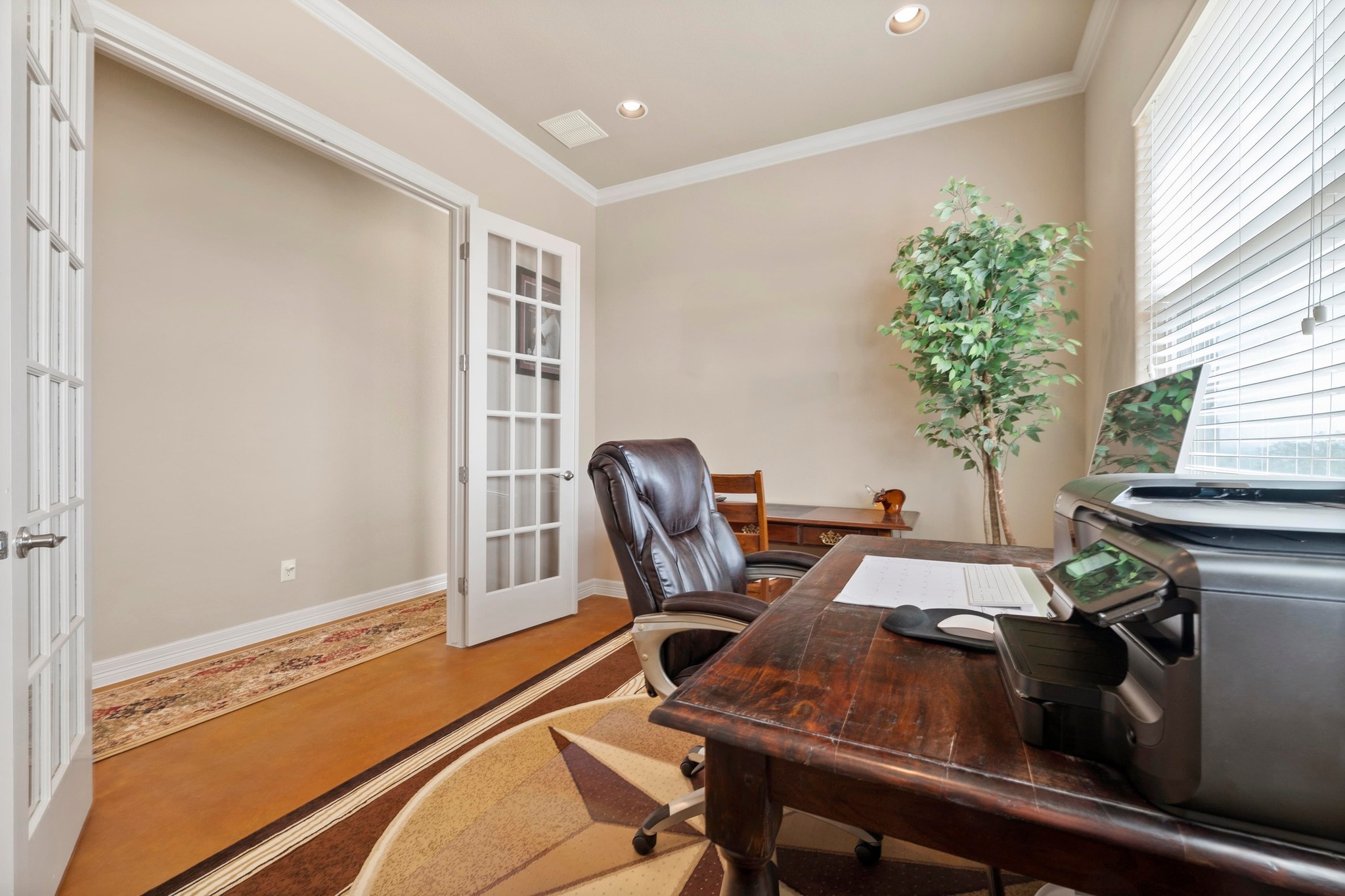 28701 Valley Road Marble Falls, TX 78654 - Photo 14 of 35 a workspace with furniture and a potted plant