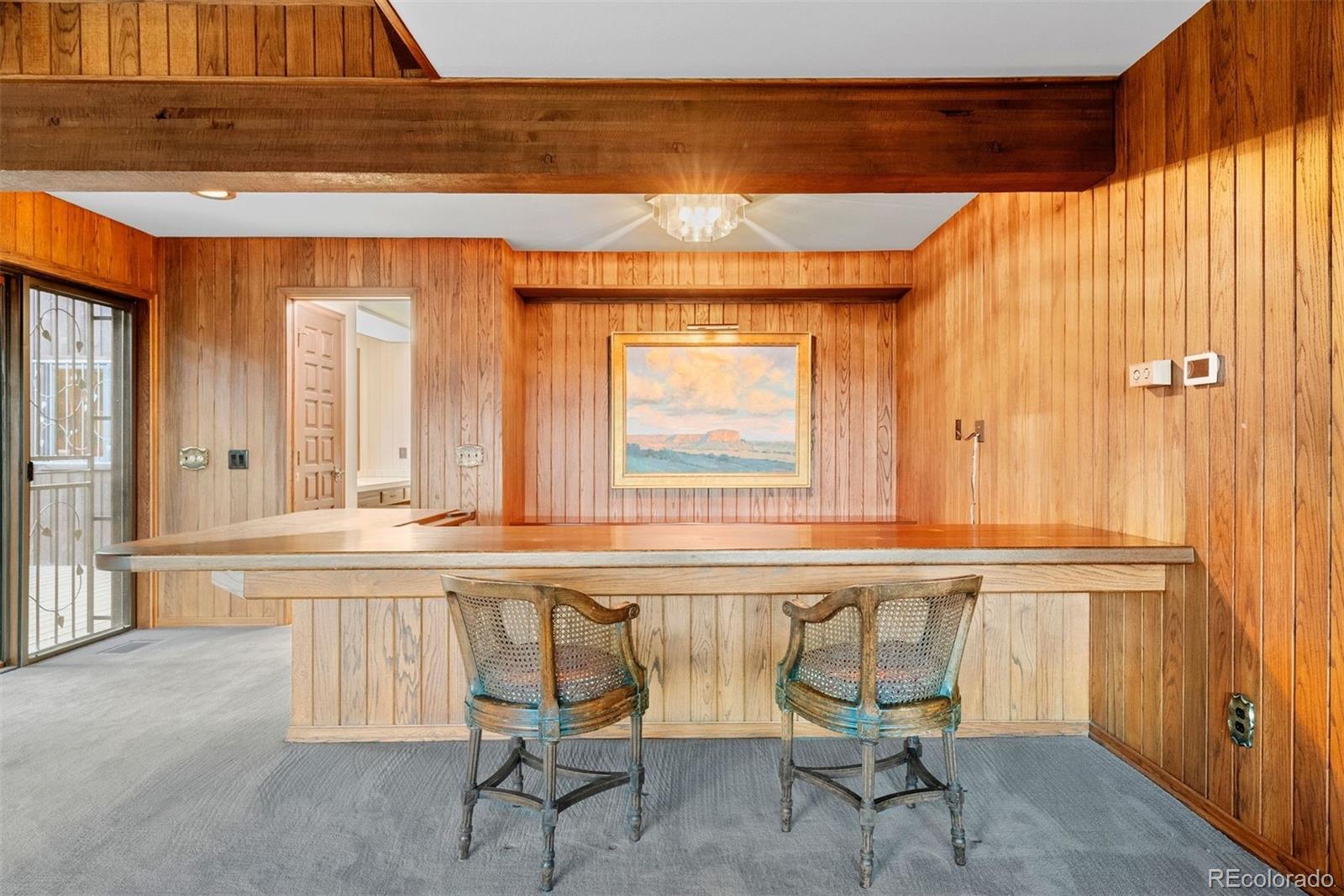 2851 Interlocken Drive Evergreen, CO 80439 - Photo 11 of 50 a view of a living room and dining area