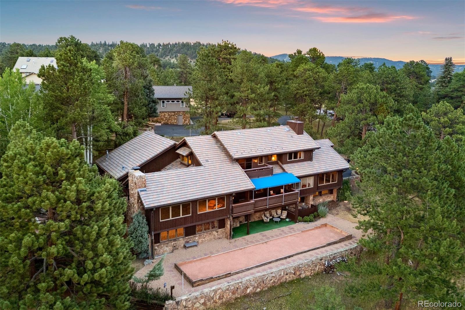 2851 Interlocken Drive Evergreen, CO 80439 - Photo 47 of 50 an aerial view of a house with a big yard