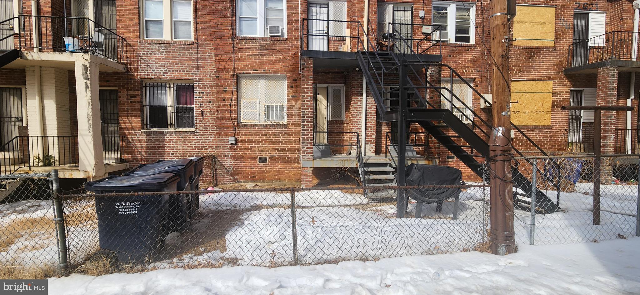 2017 I Street Northeast, Unit 4 Washington, DC 20002 - Photo 17 of 27 a street view with tall buildings