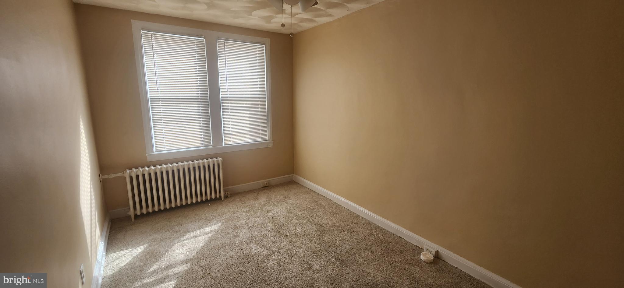 2017 I Street Northeast, Unit 4 Washington, DC 20002 - Photo 20 of 27 an empty room with windows