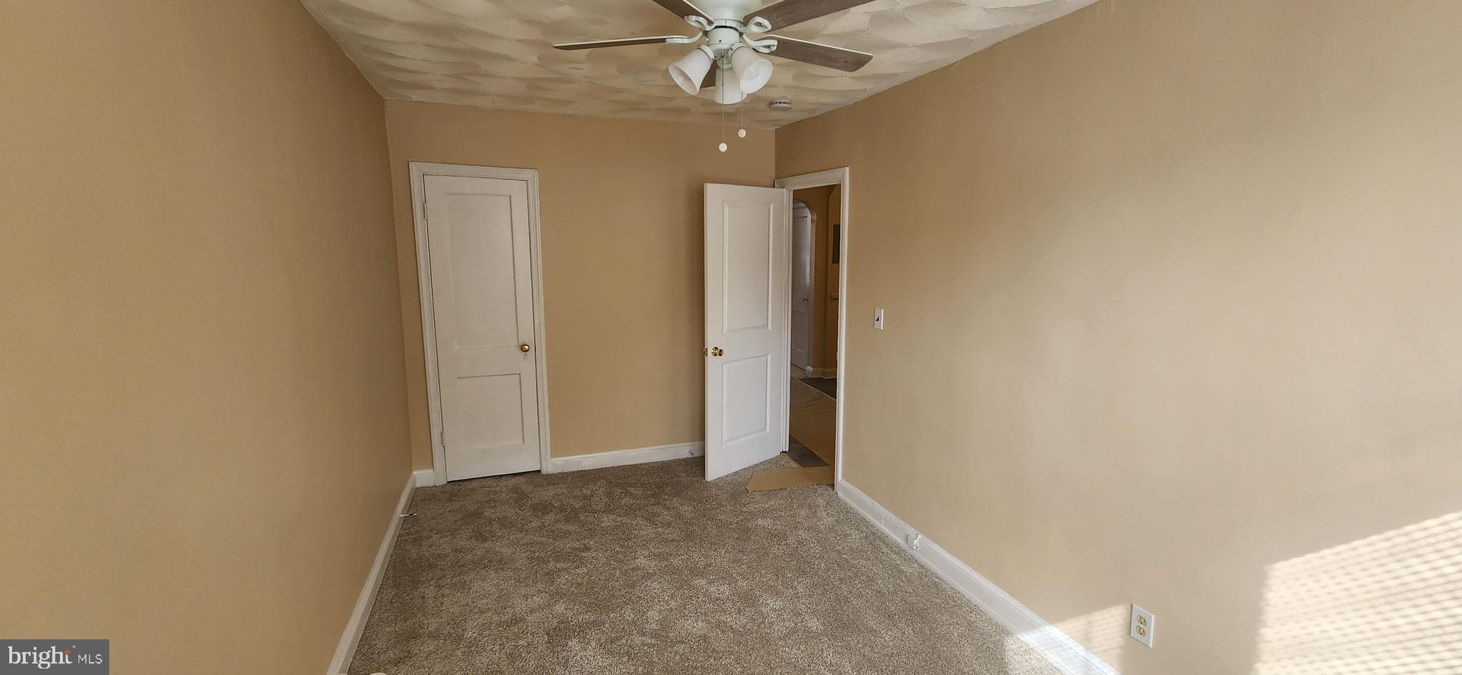 2017 I Street Northeast, Unit 4 Washington, DC 20002 - Photo 22 of 27 a view of a livingroom with a ceiling fan and window