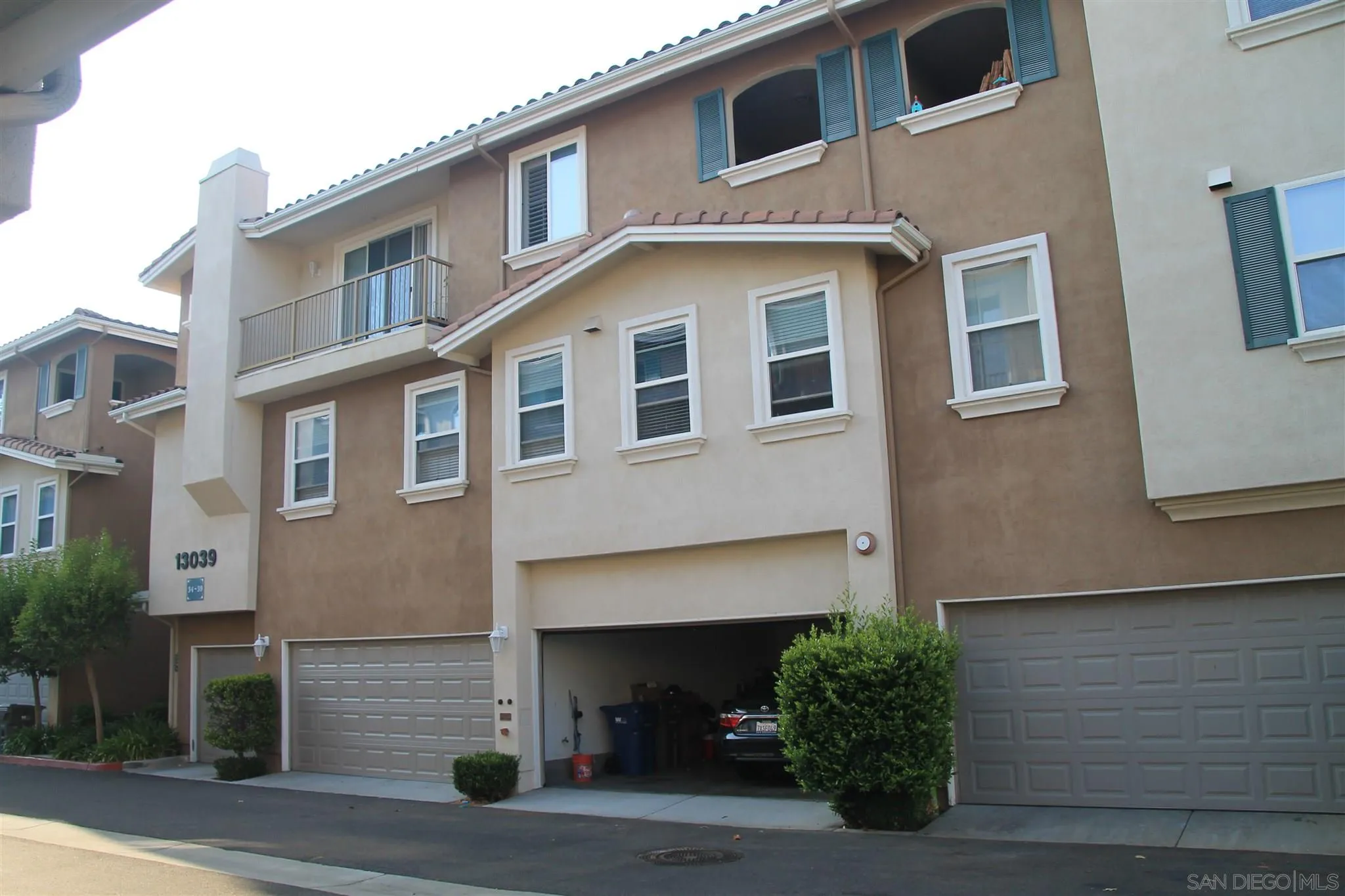 a view of a building with a street