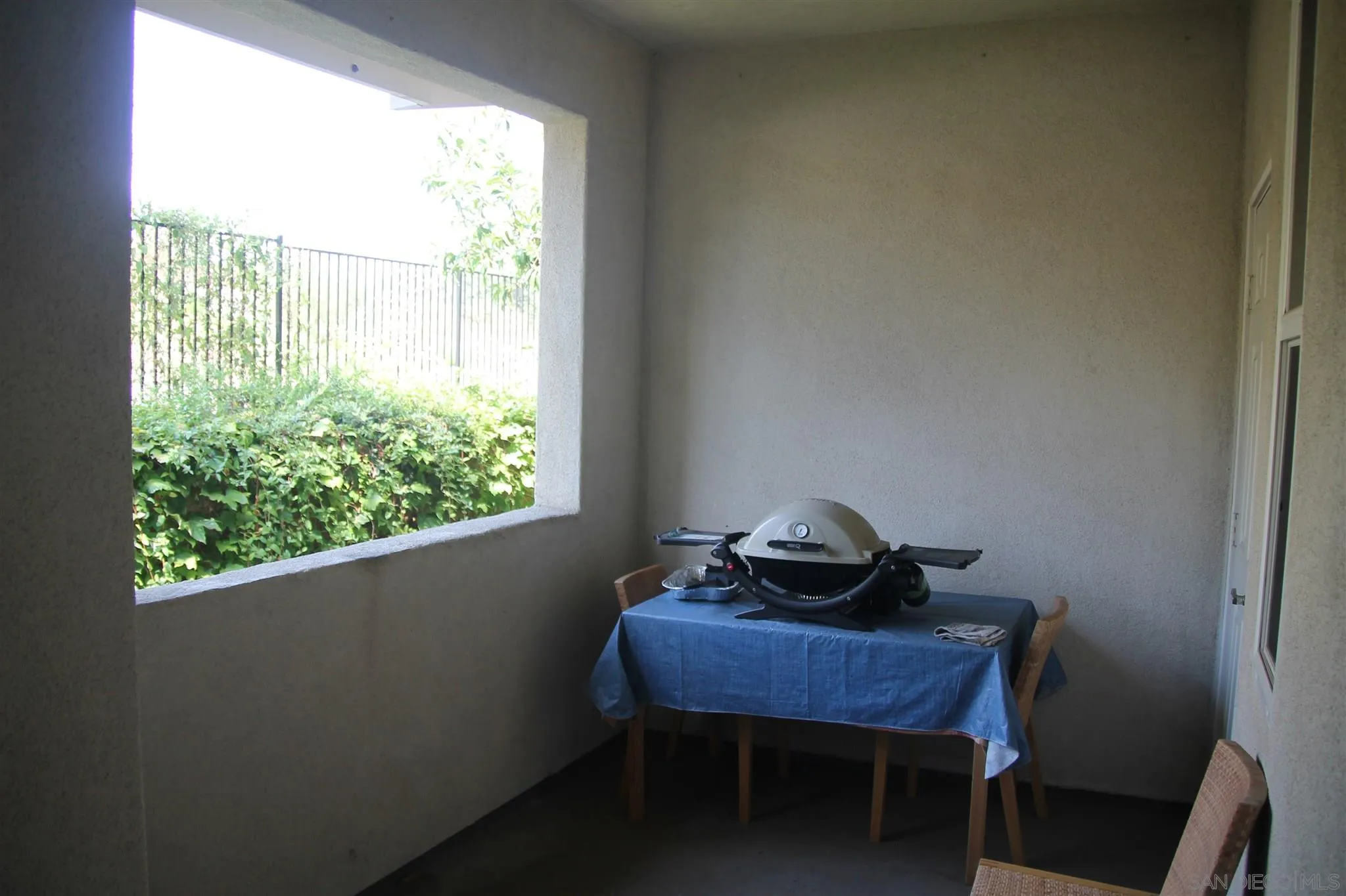 13039 Evening Creek Drive South, Unit 36 San Diego, CA 92128 - Photo 13 of 31 a view of a workspace with a window