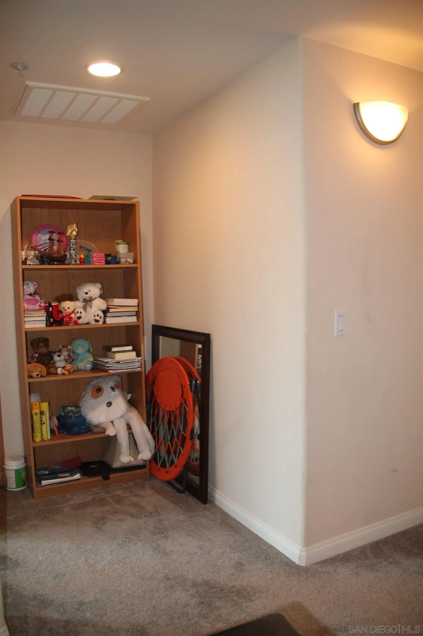 13039 Evening Creek Drive South, Unit 36 San Diego, CA 92128 - Photo 15 of 31 a view of room with window