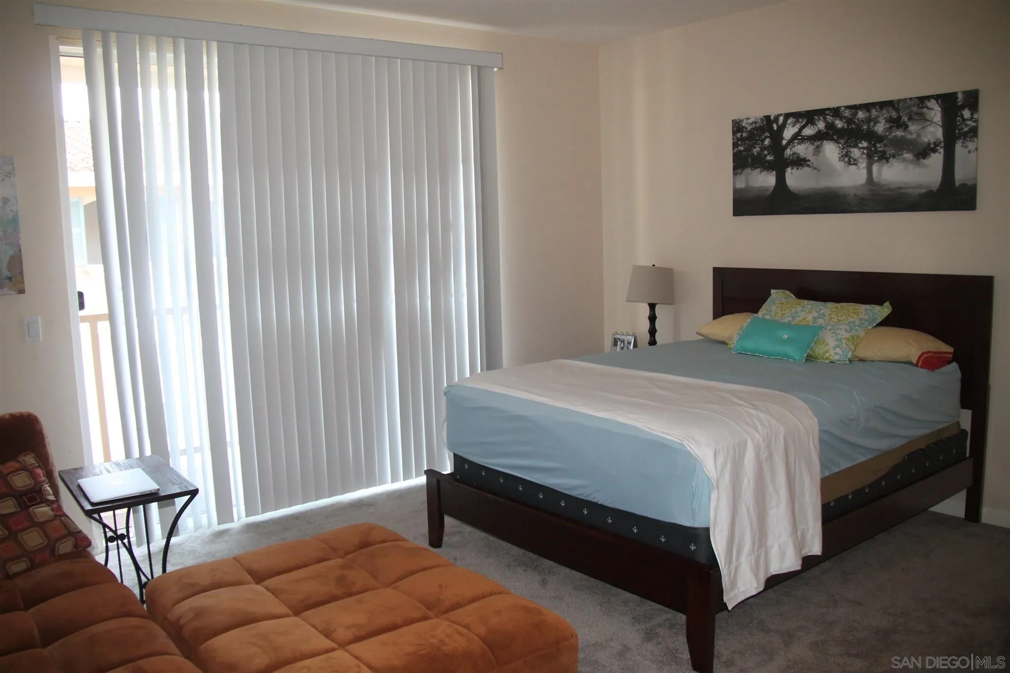 13039 Evening Creek Drive South, Unit 36 San Diego, CA 92128 - Photo 22 of 31 a bedroom with a bed and a window