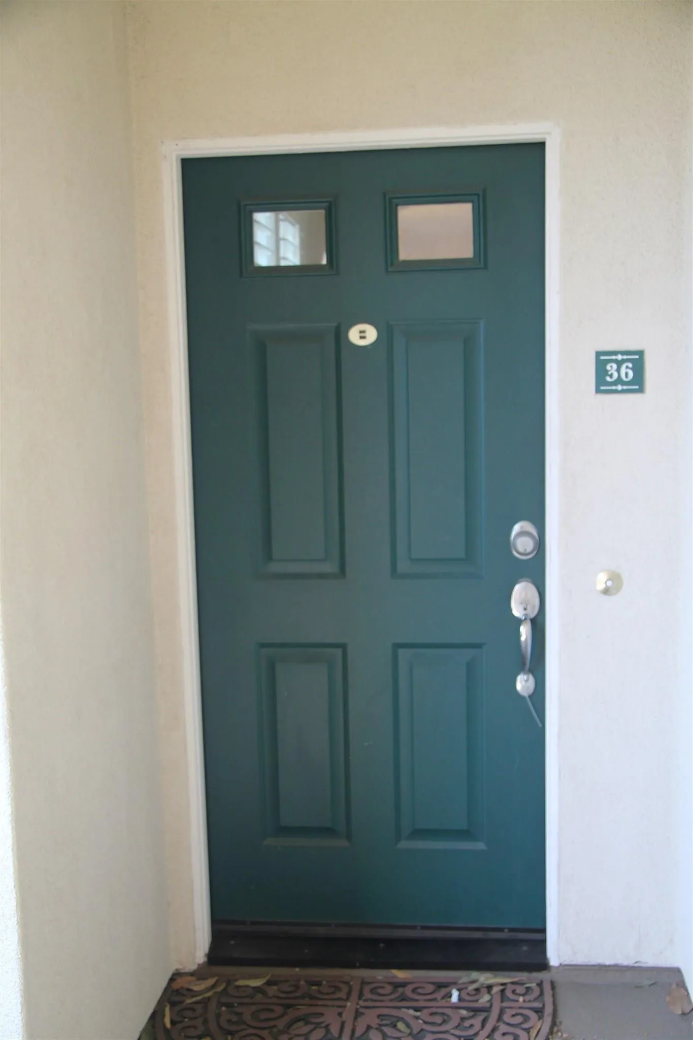 13039 Evening Creek Drive South, Unit 36 San Diego, CA 92128 - Photo 30 of 31 a view of a wooden door