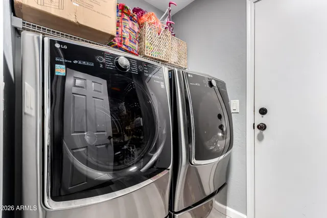 view of a utility room with washer and dryer