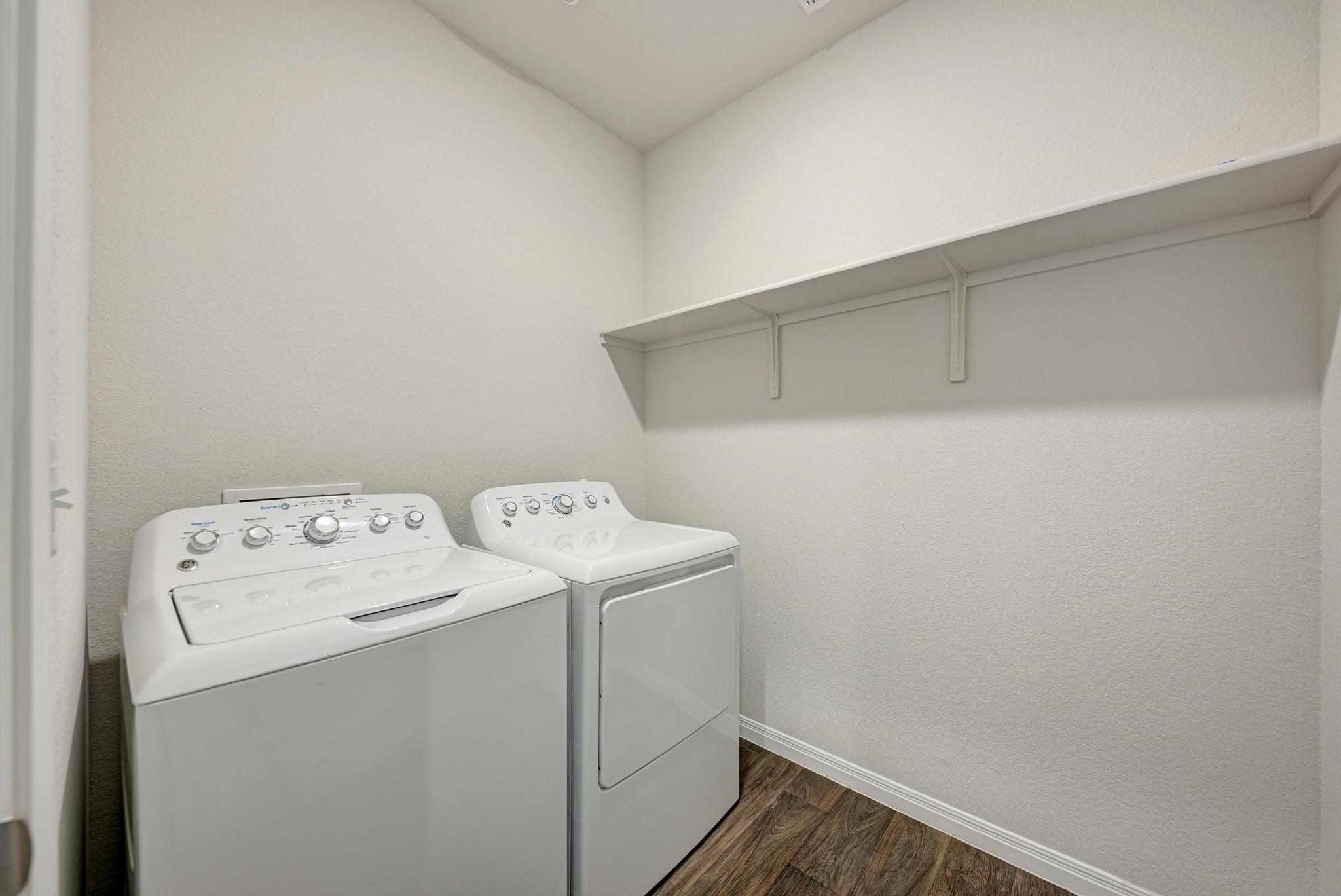 208 Abby Road Georgetown, TX 78626 - Photo 35 of 40 a utility room with dryer and washer