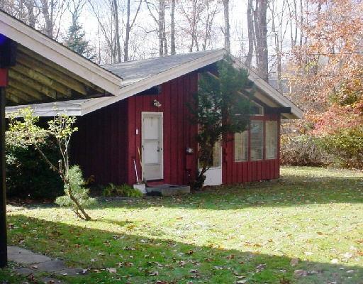 a view of a backyard of the house