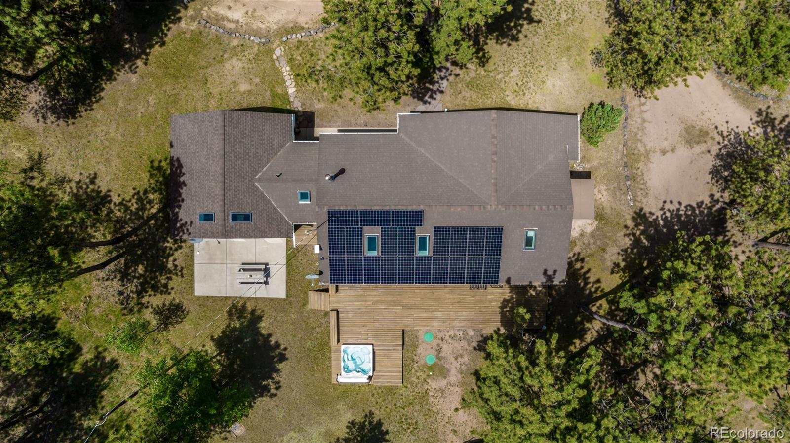 95 Double Tree Road Bailey, CO 80421 - Photo 38 of 40 an aerial view of a house with yard