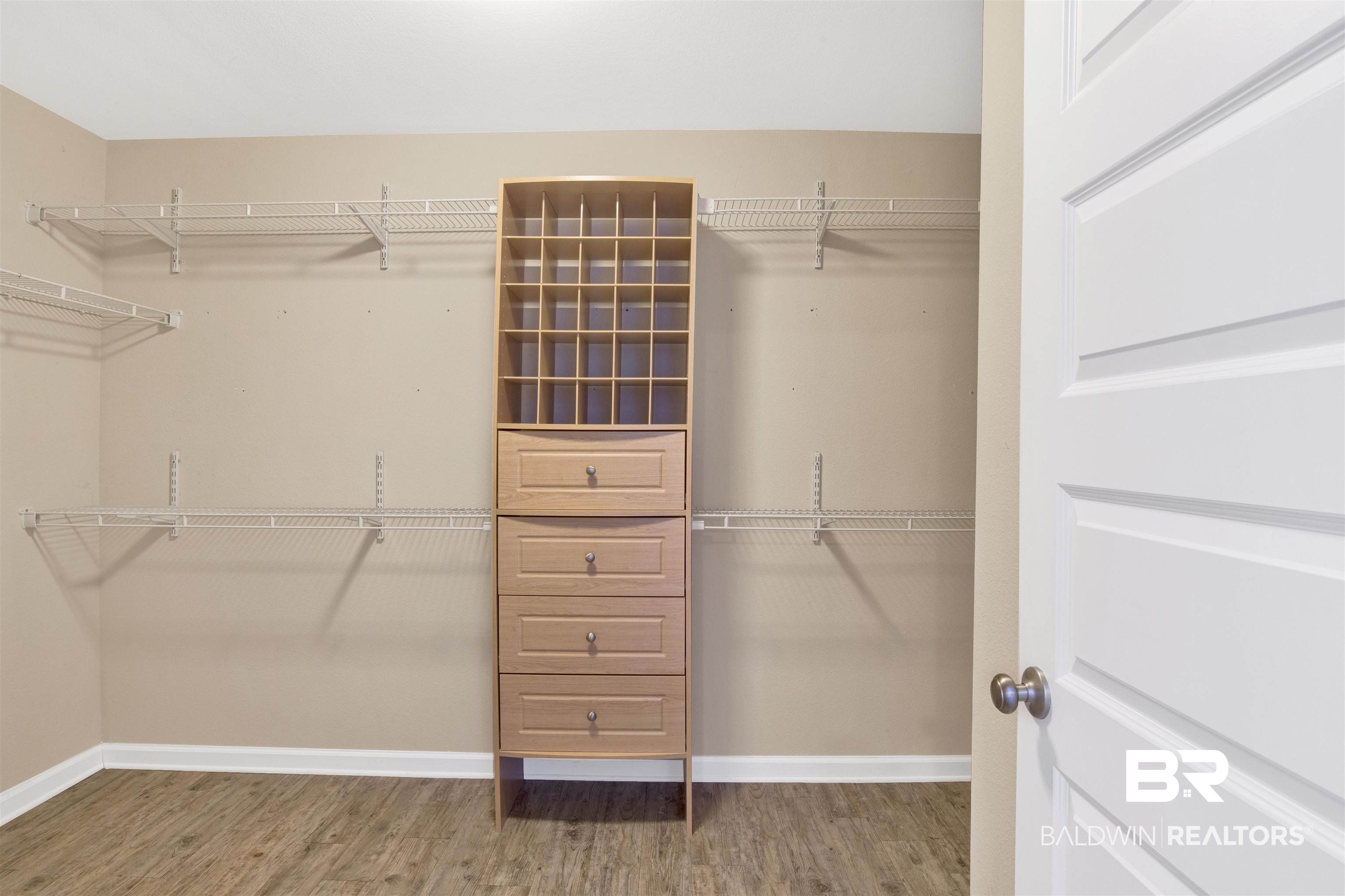 6926 Crimson Ridge Street Gulf Shores, AL 36542 - Photo 9 of 18 Spacious closet featuring light wood-style flooring