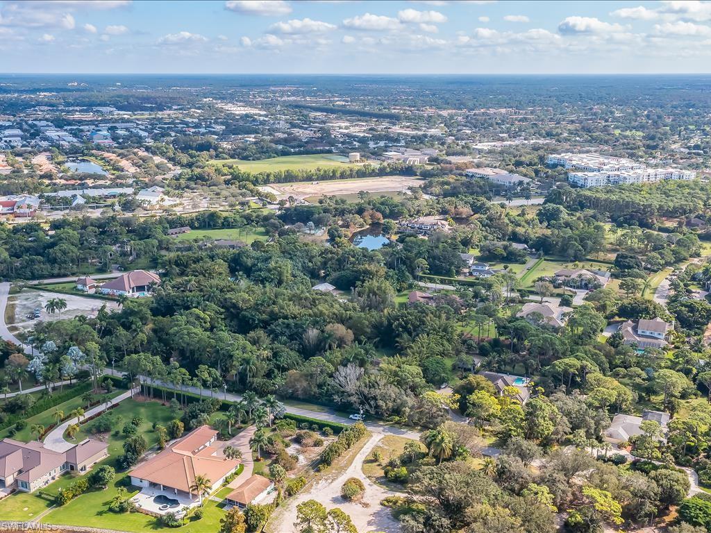176 Caribbean Road Naples, FL 34108 - Photo 3 of 3 an aerial view of multiple house
