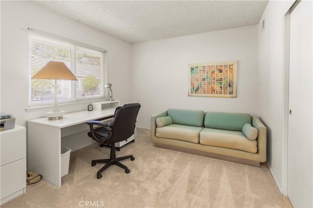 24142 Minnetonka Lane Lake Forest, CA 92630 - Photo 23 of 30 a living room with furniture and a window